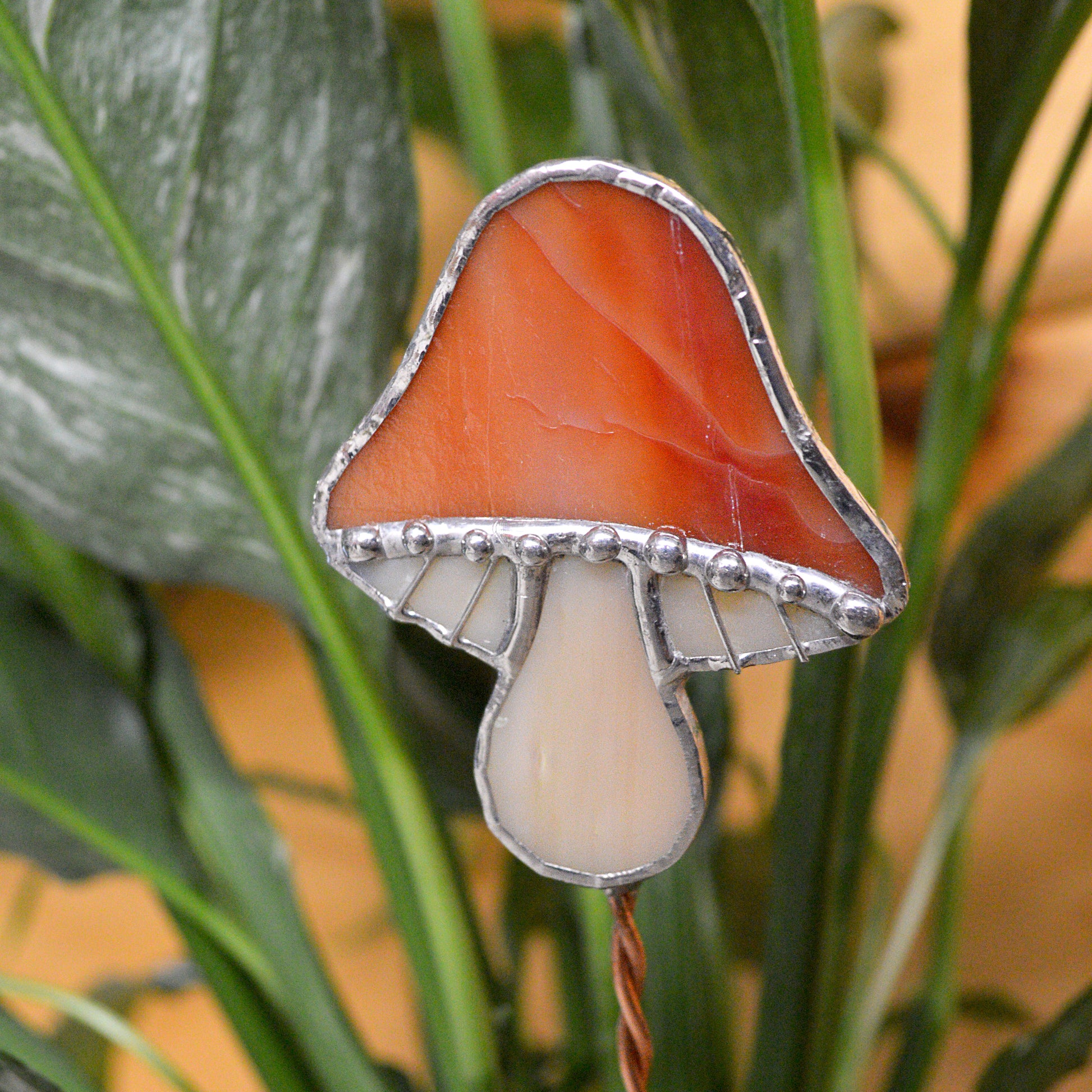 Adorable stained glass mushroom. Locally made and a great gift for all plant lovers!