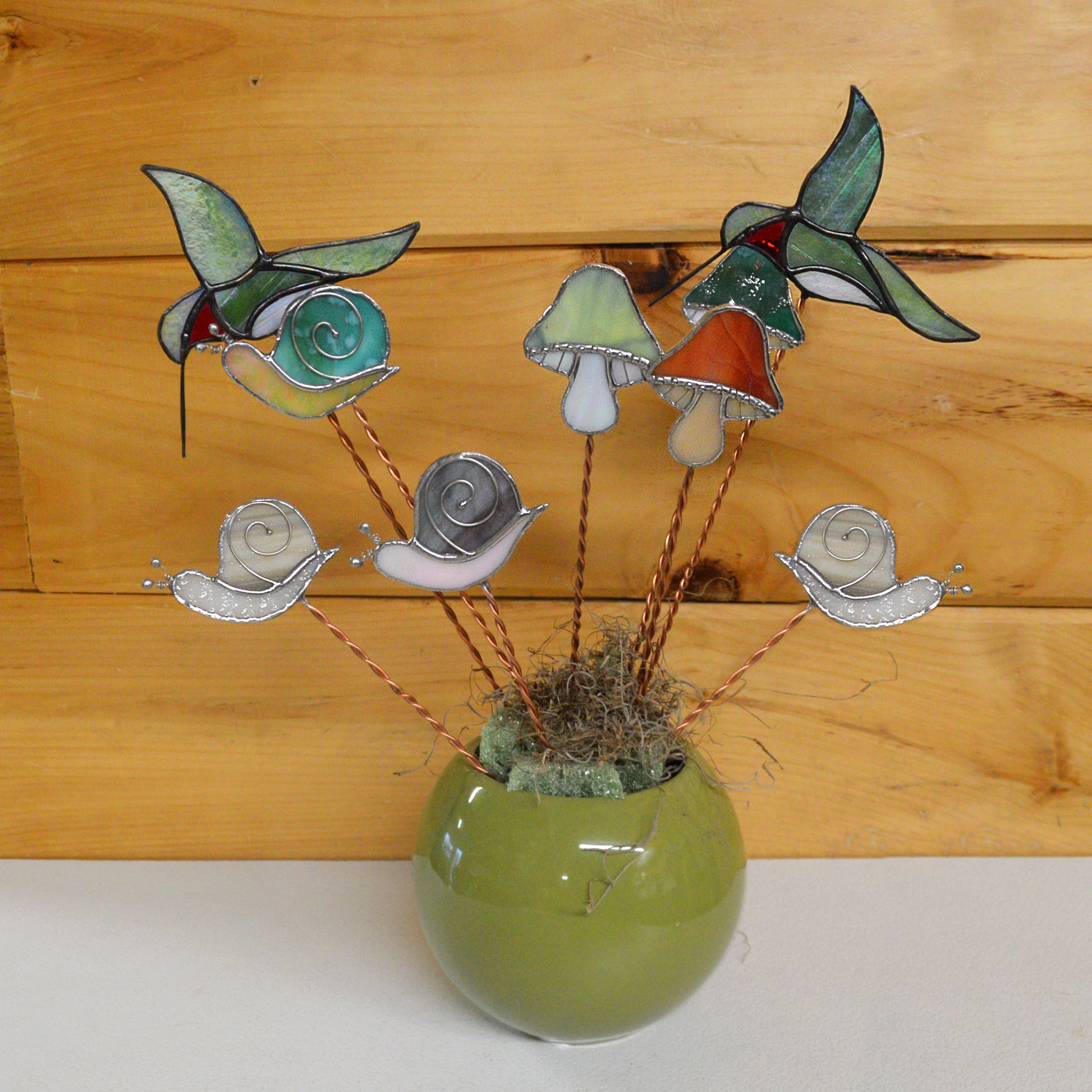Adorable stained glass plant buddies in different fun shapes. Perfect gift for plant lovers, and animal lovers.