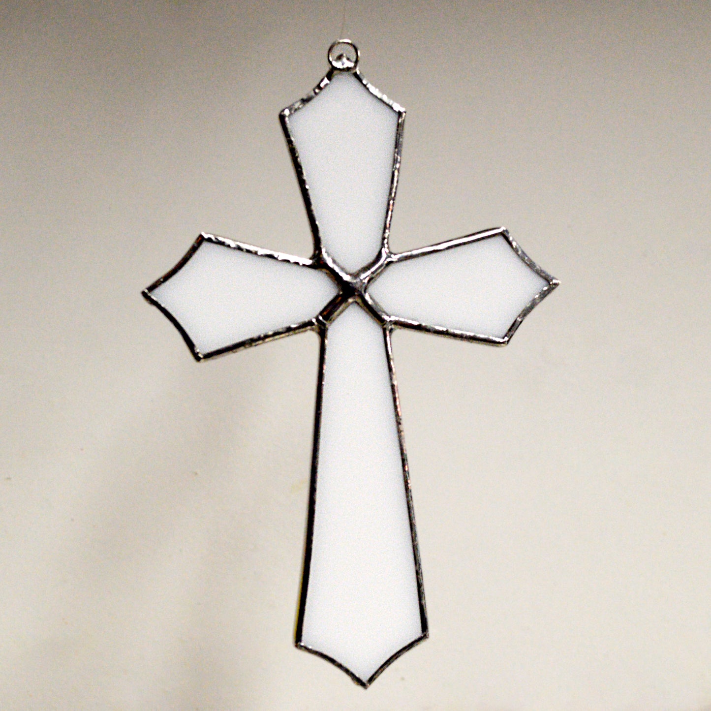 This beautiful cross suncatcher hangs perfectly in any window, and will brighten up your living space! Great for commemoration, as a communion gift, and more! It would also make a great gift great addition to any floral arrangement! All stained glass is handmade by Deb's Broken glass in Bathurst NB.