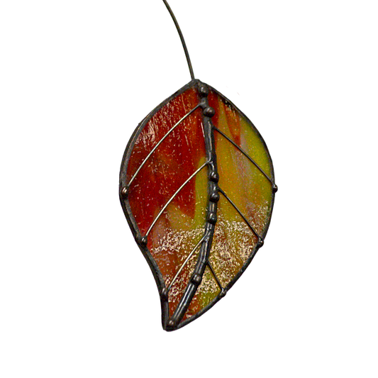 This decorative leaf shaped stained glass suncatcher is a great for window decoration, as a gift and more! Hang it up in your window to see the full beauty of the stained glass, add it to a floral arraignment, or use it as a gift for the nature lover in your life.   All stained glass is handmade by Deb's Broken glass in Bathurst NB.  