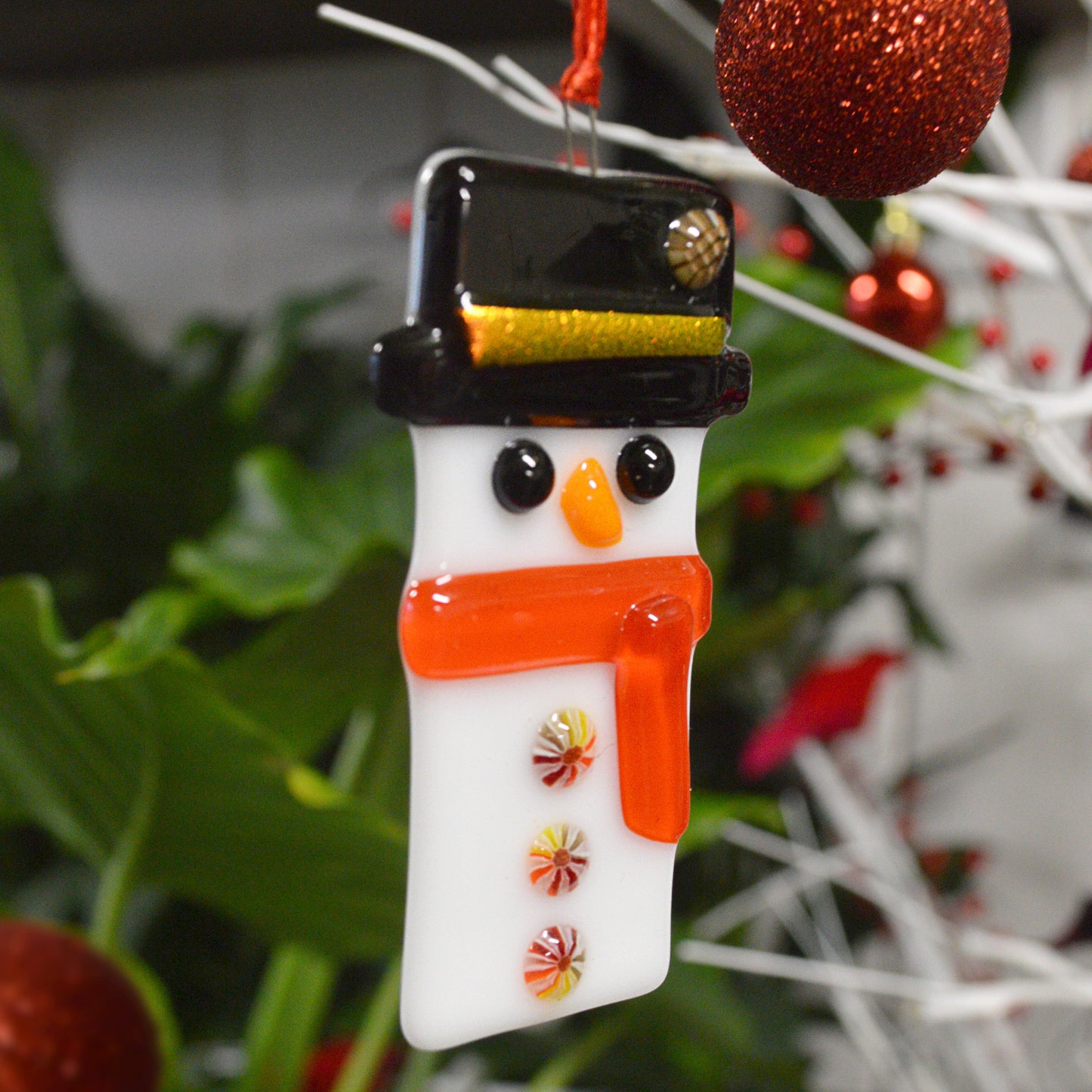 Beautiful local stained glass snowman ornament made by local artist Deb's Broken Glass.