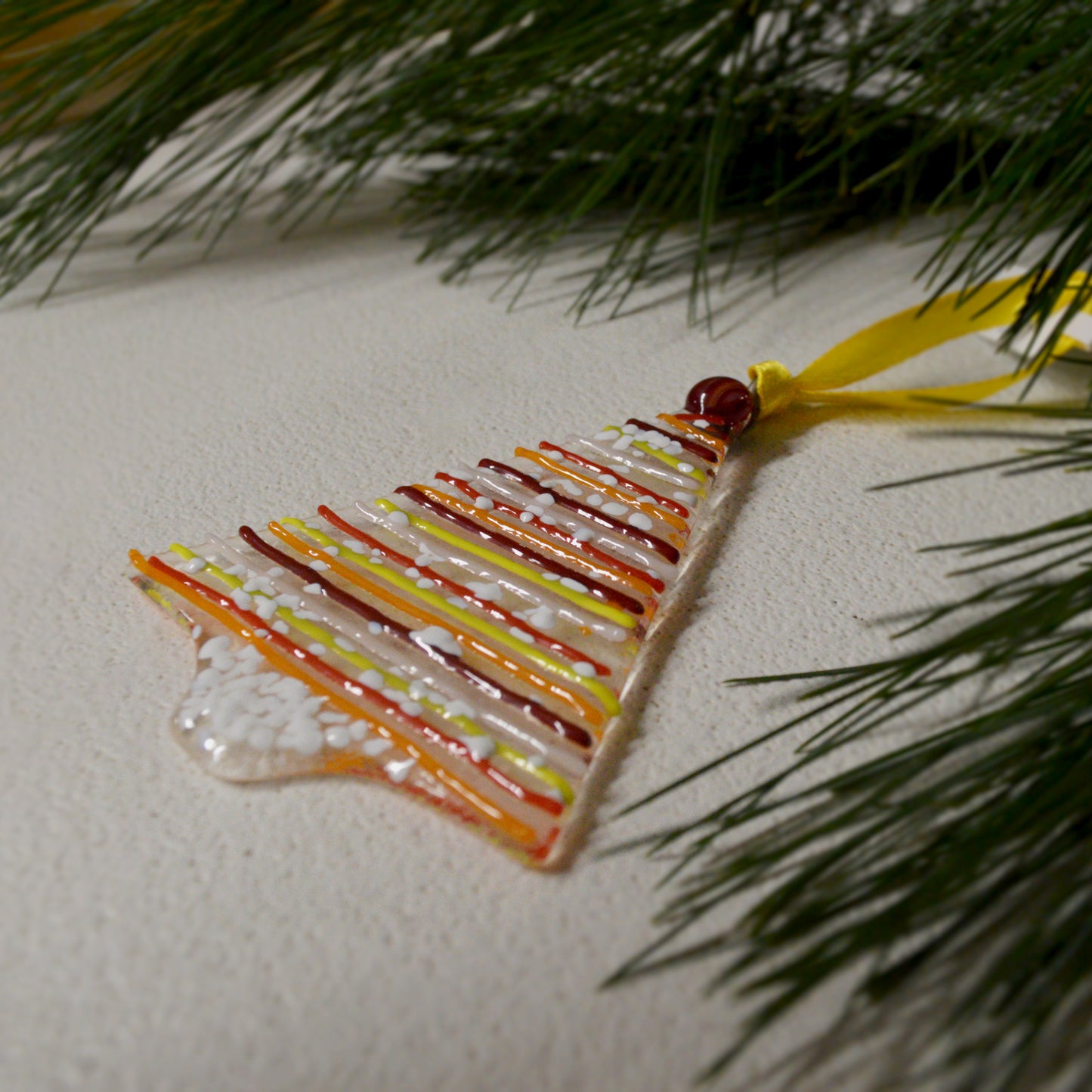 This holiday tree shaped stained glass ornament is the perfect decoration for this holiday season. Hang it in your window or on your Christmas tree to really liven up your space! It would also make a great gift or stocking stuffer or a great addition to any floral arrangement! All stained glass is handmade by Deb's Broken glass in Bathurst NB.
