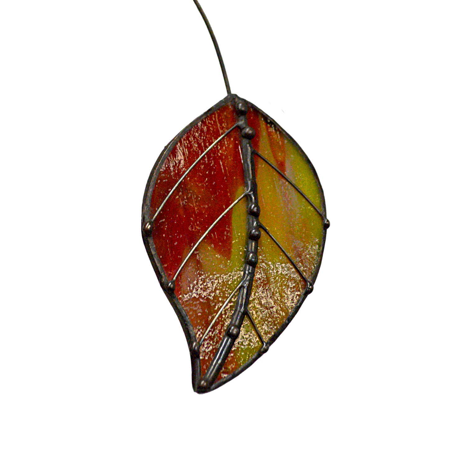 This decorative leaf shaped stained glass suncatcher is a great for window decoration, as a gift and more! Hang it up in your window to see the full beauty of the stained glass, add it to a floral arraignment, or use it as a gift for the nature lover in your life.   All stained glass is handmade by Deb's Broken glass in Bathurst NB.  